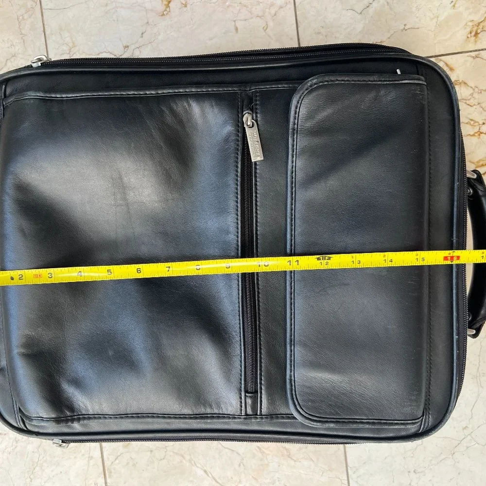 Wilson’s Black Leather Carry on Luggage.